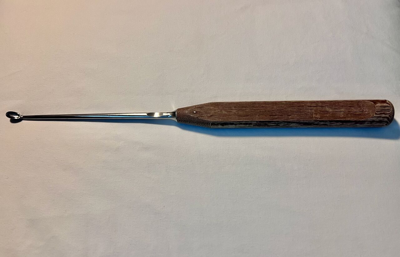 SYNTHES 389.59 Angled Oval-Head Bone Curette 9.5mm — photo 1