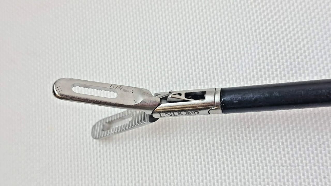 V. MUELLER EndoLap F256.99100 w/ 256.02 Rotating Handle Fenestrated Grasper 5mm — photo 5