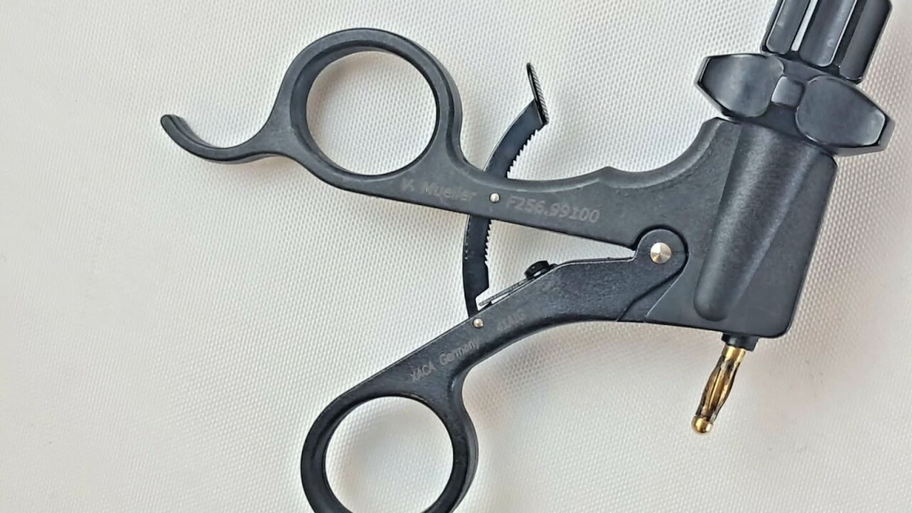 V. MUELLER EndoLap F256.99100 w/ 256.02 Rotating Handle Fenestrated Grasper 5mm — photo 3