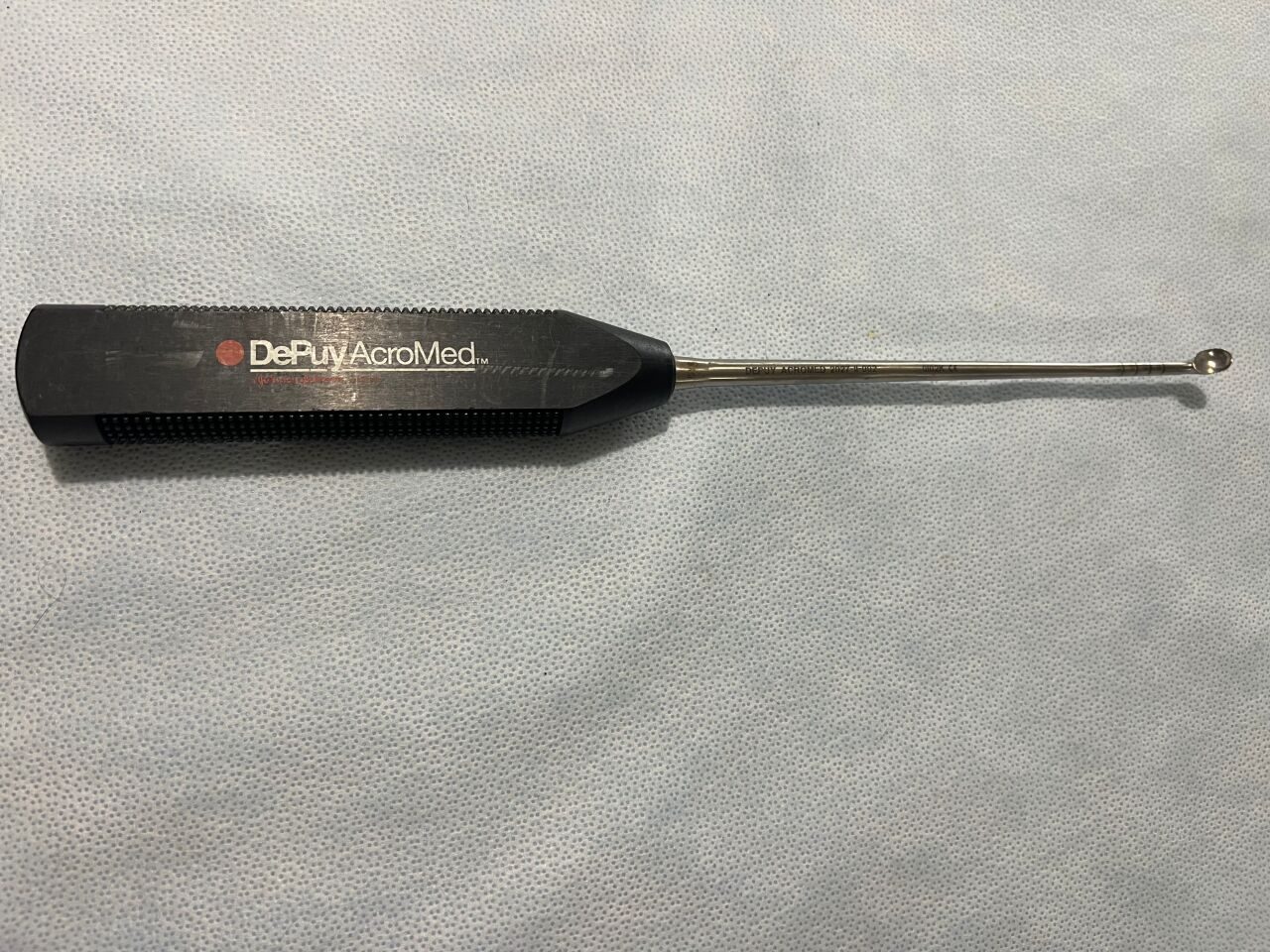2027-11-002 TLIF Angled Up Cup Curette — photo 1